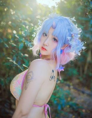 田丸麻纪子